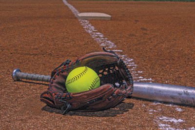 softball in glove stock